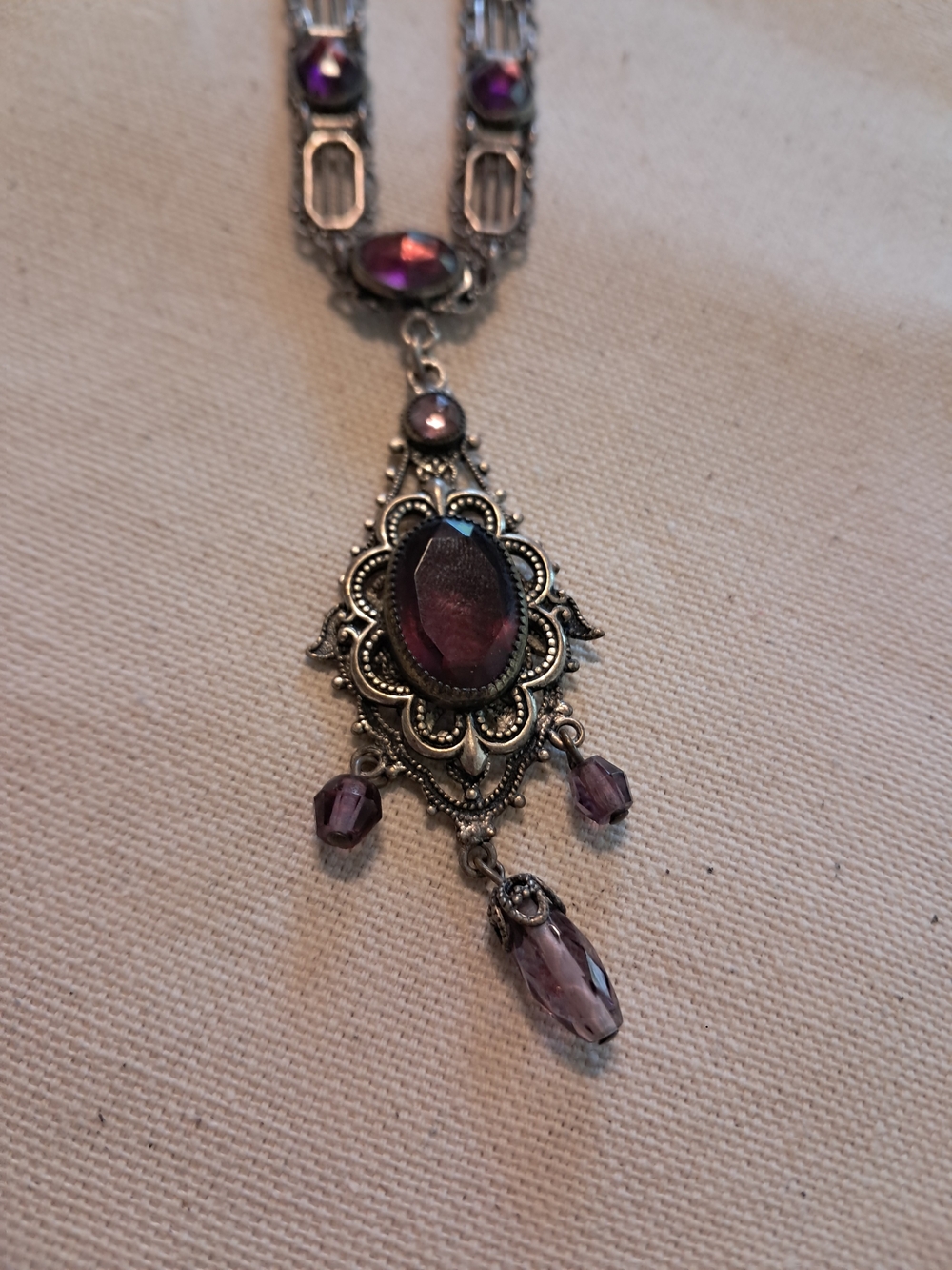 Vintage Art Nouveau Elegant purple pendant necklace with intricate silver-tone